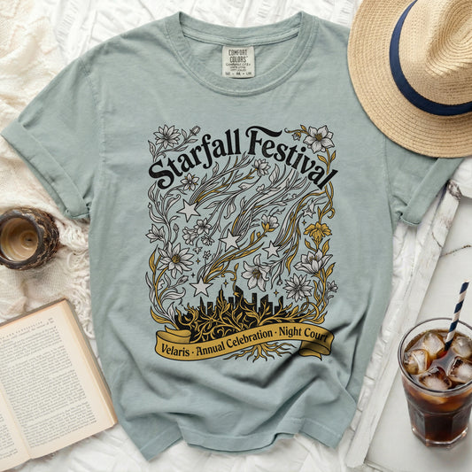 Light blue t-shirt with "Starfall Festival Velaris Annual Celebration Night Court" graphic.