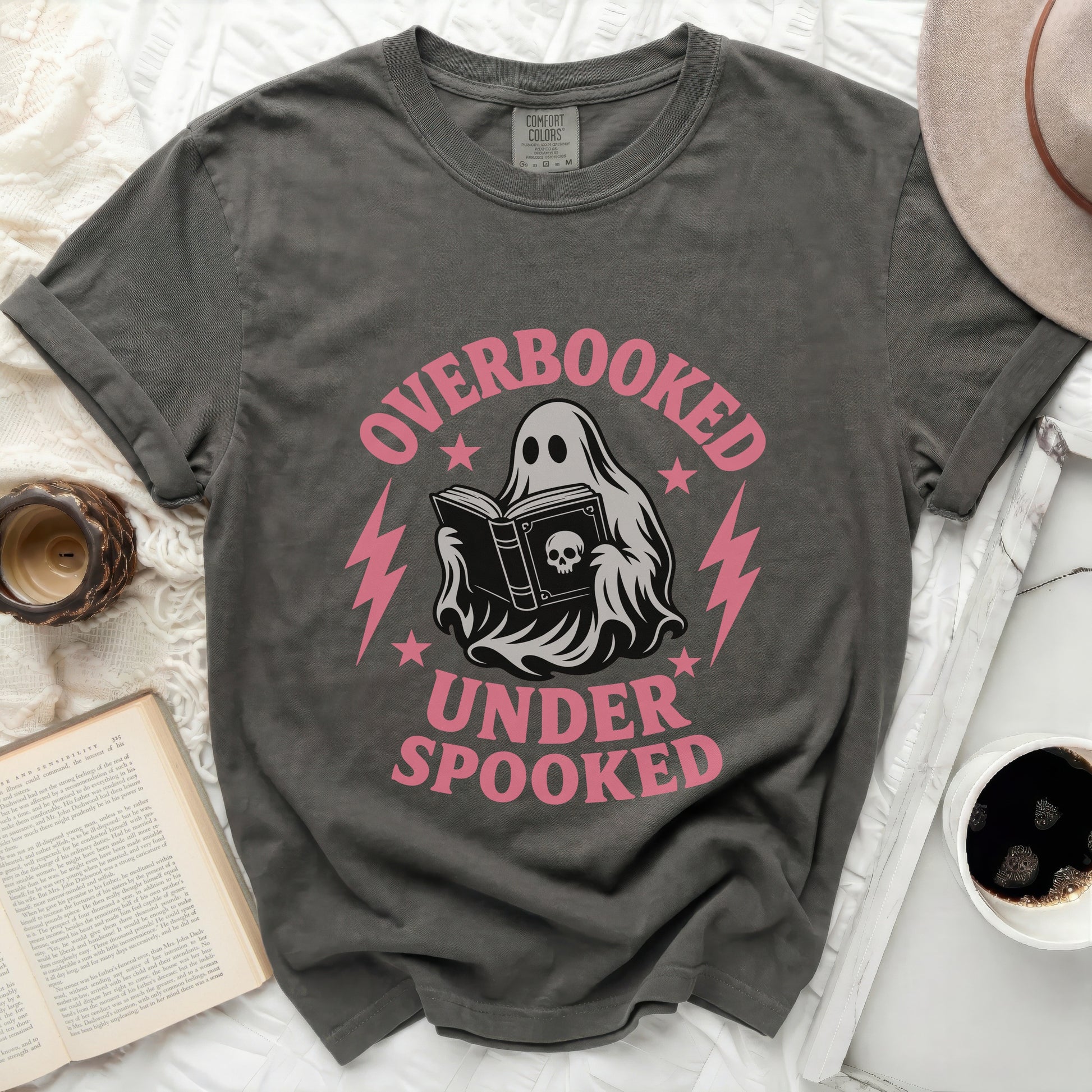 Ghost reading book with "Overbooked Under Spooked" text.