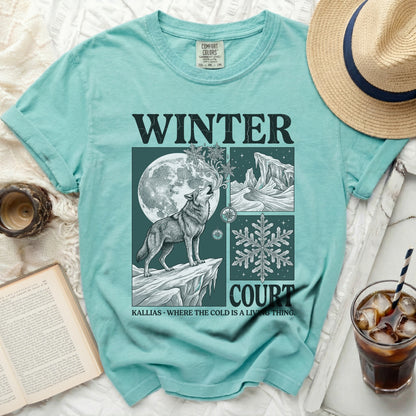 Teal t-shirt with "WINTER COURT" and wolf design, with quote "WHERE THE COLD IS A LIVING THING".