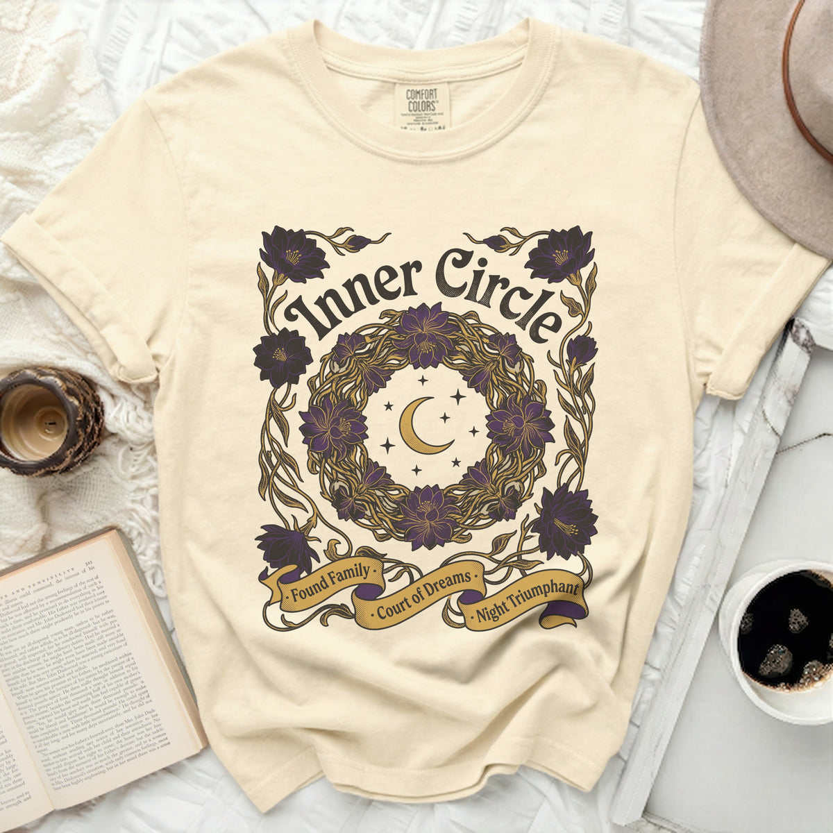 Cream t-shirt with "Inner Circle" and floral wreath graphic.