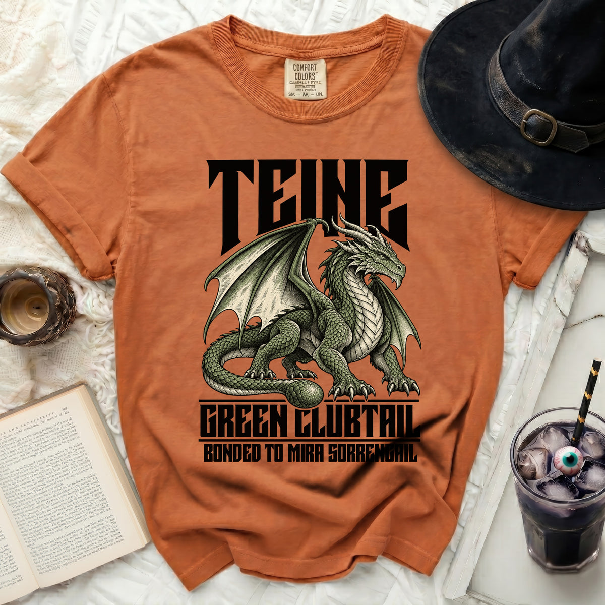 Orange t-shirt with black dragon graphic and text "TEINE GREEN CLUBTAIL BONDED TO MIRA SORRENGAIL".