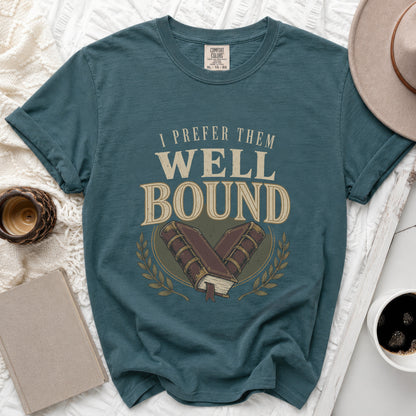 Teal t-shirt with "I PREFER THEM WELL BOUND" text and two crossed books.
