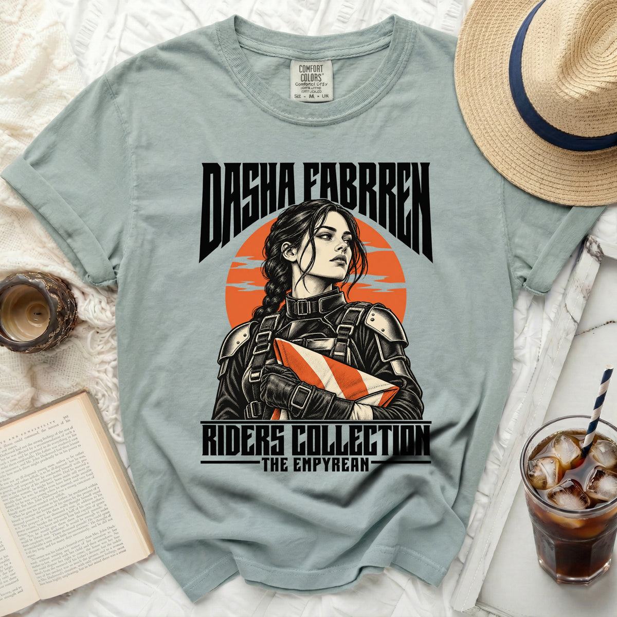 T-shirt with a warrior woman graphic and text "Dasha Fabrren Riders Collection The Empyrean".
