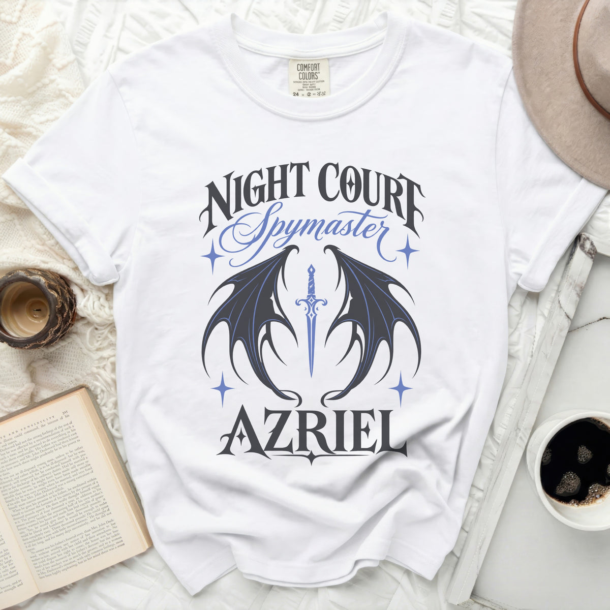 White t-shirt with "Night Court Spymaster Azriel" graphic featuring wings and a sword.