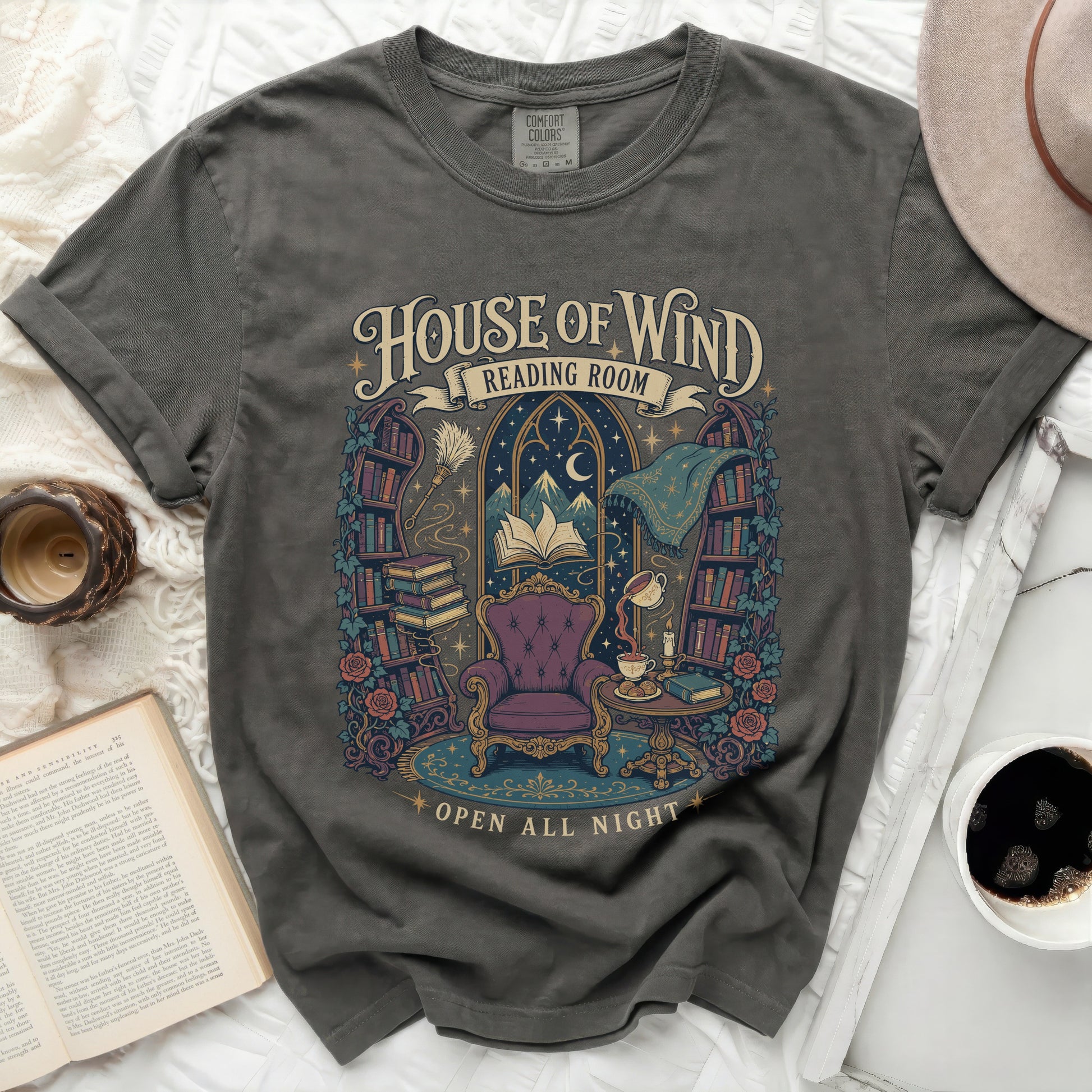 Dark grey t-shirt with "House of Wind Reading Room Open All Night" graphic.