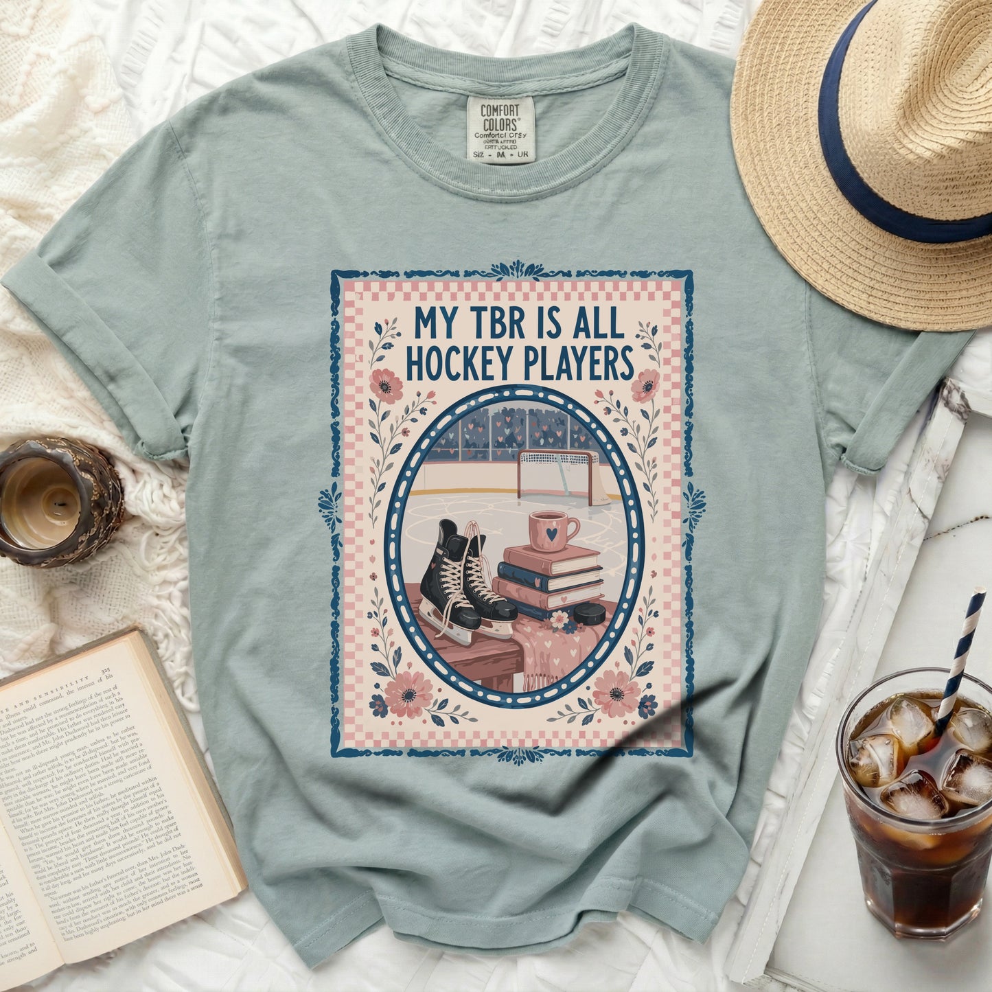 T-shirt with "My TBR is All Hockey Players" text and hockey rink illustration.