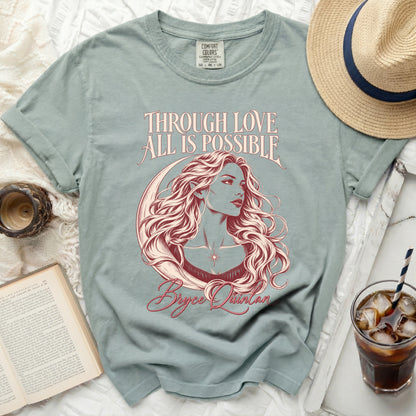 Light blue t-shirt with "Through Love All Is Possible" and Bryce Quinlan art.