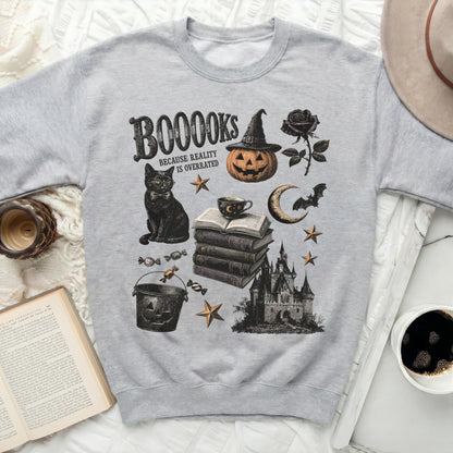 Sweatshirt with "BOOOOKS Because Reality Is Overrated" and Halloween-themed illustrations.