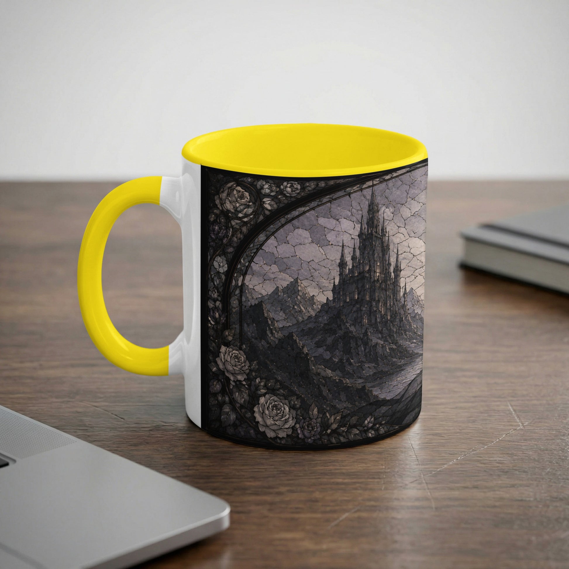 White mug with yellow handle featuring a dark, gothic castle and roses design.