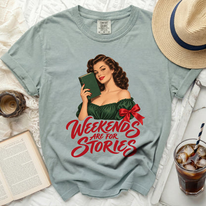 T-shirt with vintage pin-up girl holding book and "Weekends Are For Stories" text.