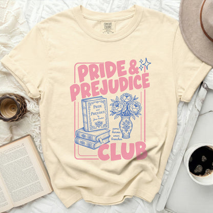 Pride and Prejudice Club graphic on a cream t-shirt with books.