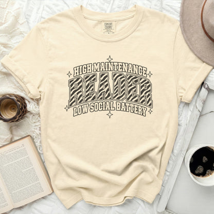 Cream t-shirt with "High Maintenance Reader" and "Low Social Battery" graphic.