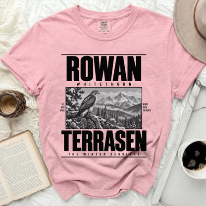 Pink t-shirt with black graphic: Rowan Whitethorn, hawk, mountains, and "Terrasen The Winter Sessions".