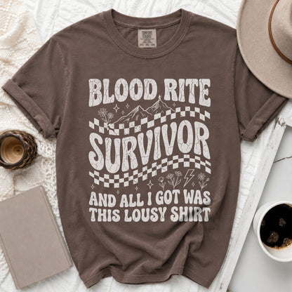 Brown t-shirt with distressed "Blood Rite Survivor" graphic and text.