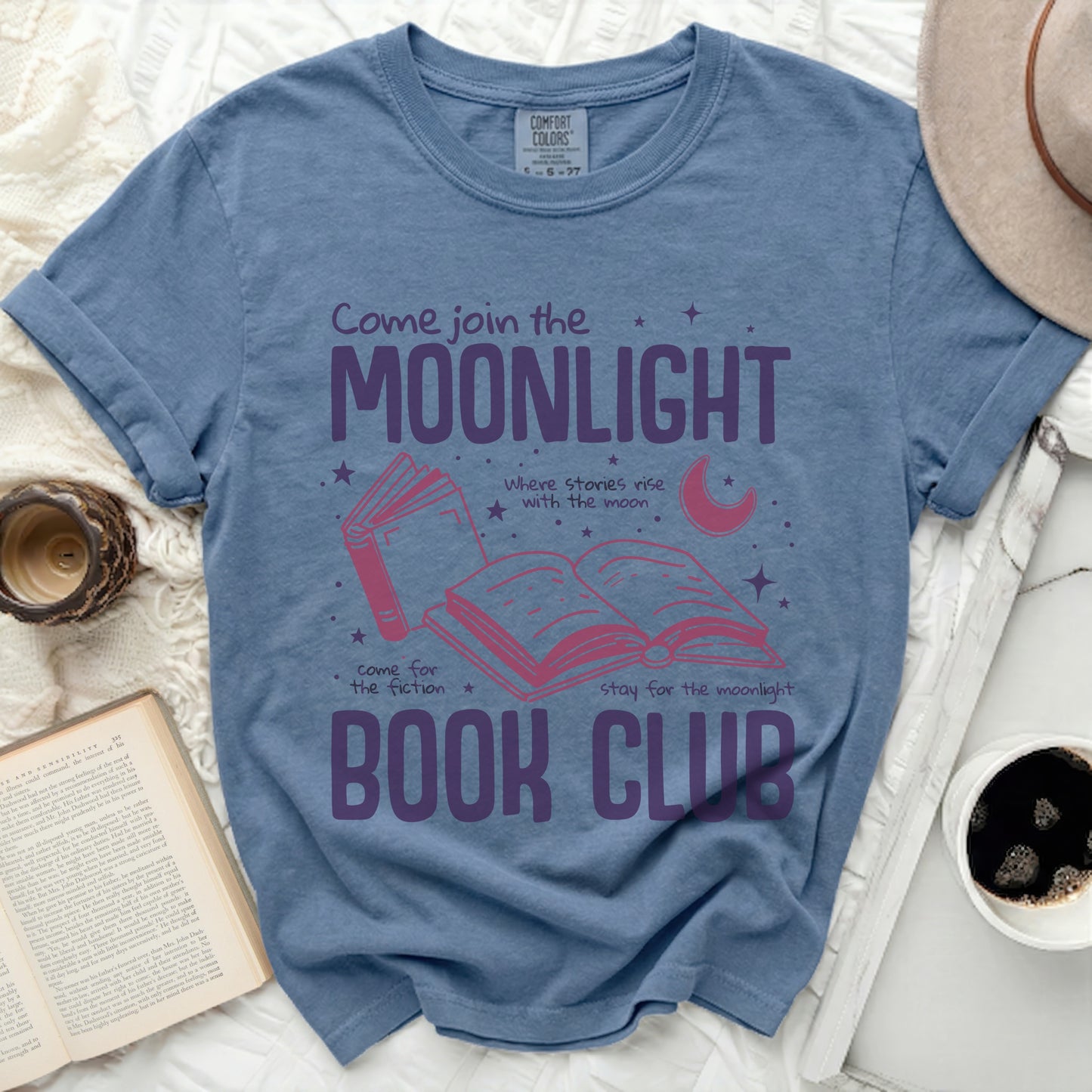 Blue t-shirt with "Come join the MOONLIGHT BOOK CLUB" and book graphics.