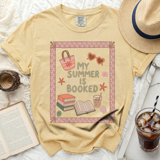 Yellow t-shirt with "MY SUMMER IS BOOKED" graphic.