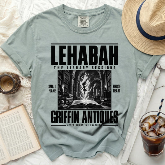 Pale green t-shirt with "LEHABAH THE LIBRARY SESSIONS" and dark illustration.