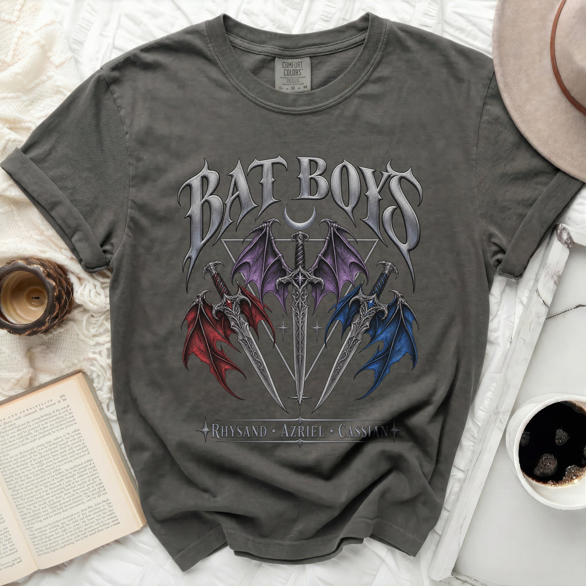 Dark gray t-shirt with "Bat Boys" text, dragon wings, and swords. Names Rhysand, Azriel, Cassian.