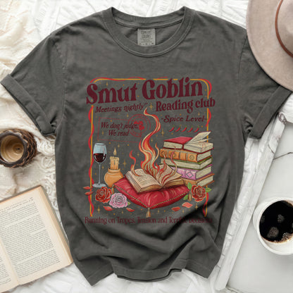Smut Goblin Reading Club shirt with book, wine, and candle graphic.