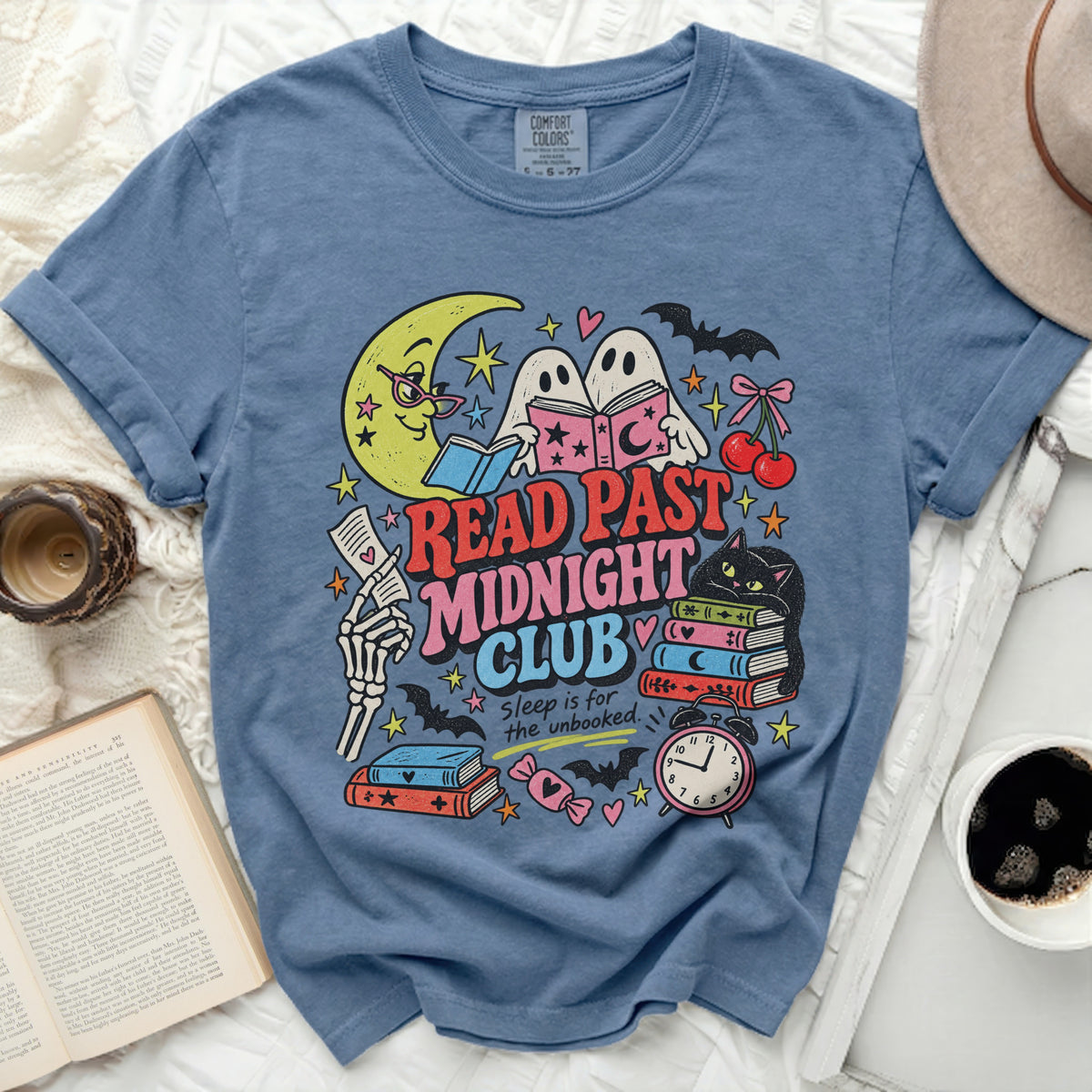 Blue t-shirt with "Read Past Midnight Club" and spooky reading graphics.