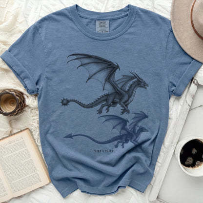 Blue t-shirt with two illustrated dragons and text "TAIRN & SGAEYL".