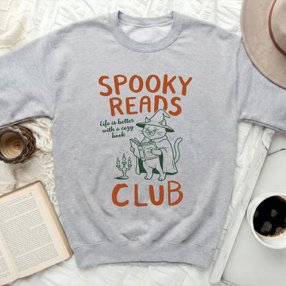 Grey sweatshirt with "Spooky Reads Club" text and cat graphic.
