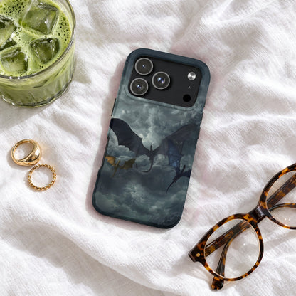 A smartphone case featuring a dragon graphic resting on white fabric near glasses and a drink.