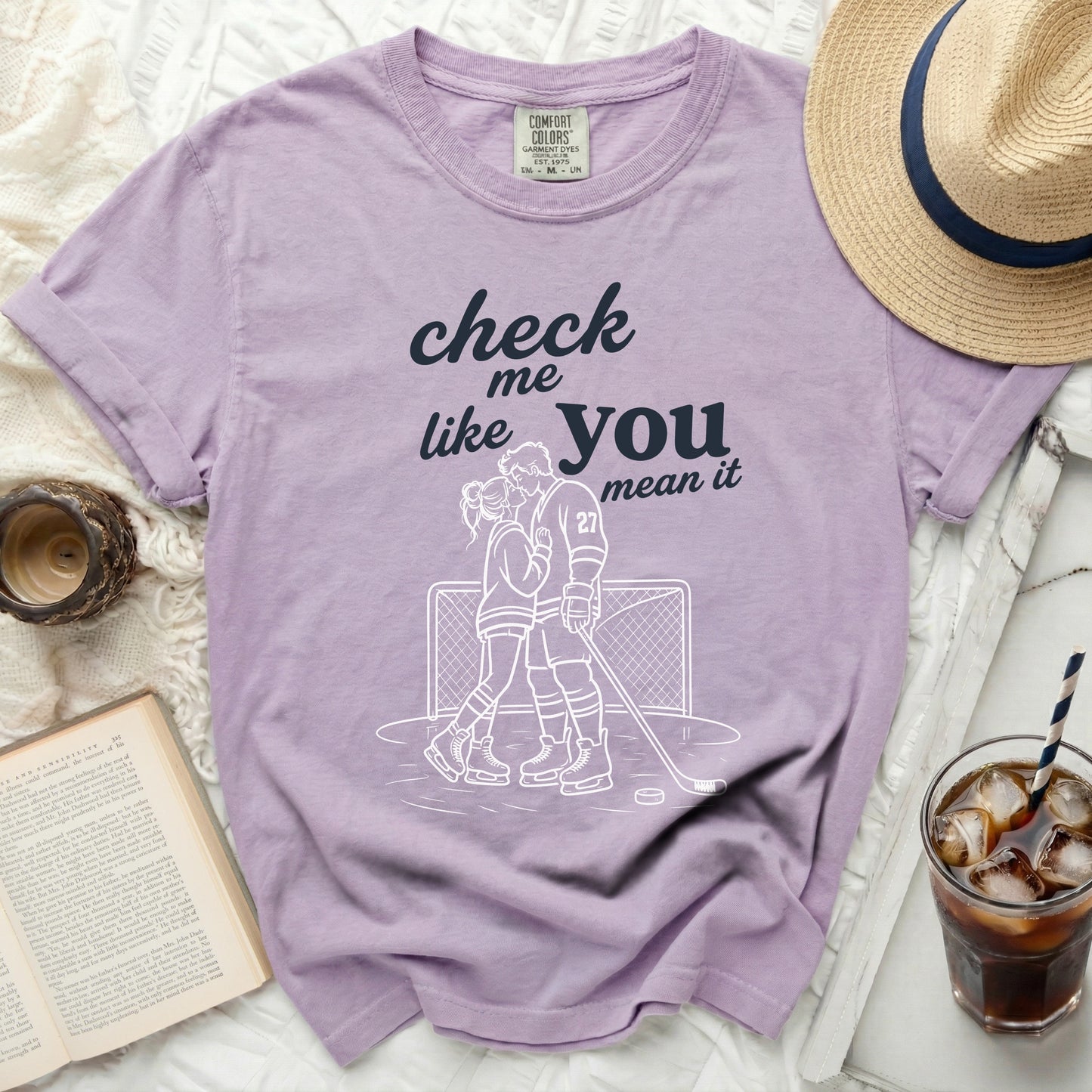 T-shirt with graphic of hockey couple and text "check me like you mean it".