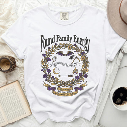 White t-shirt with "Found Family Energy Night Court The Inner Circle" graphic.