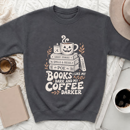 Dark grey sweatshirt with "Books like my coffee dark and my darker" text and Halloween graphics.