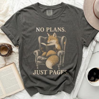 Graphic of a fox reading a book with text "NO PLANS. JUST PAGES."