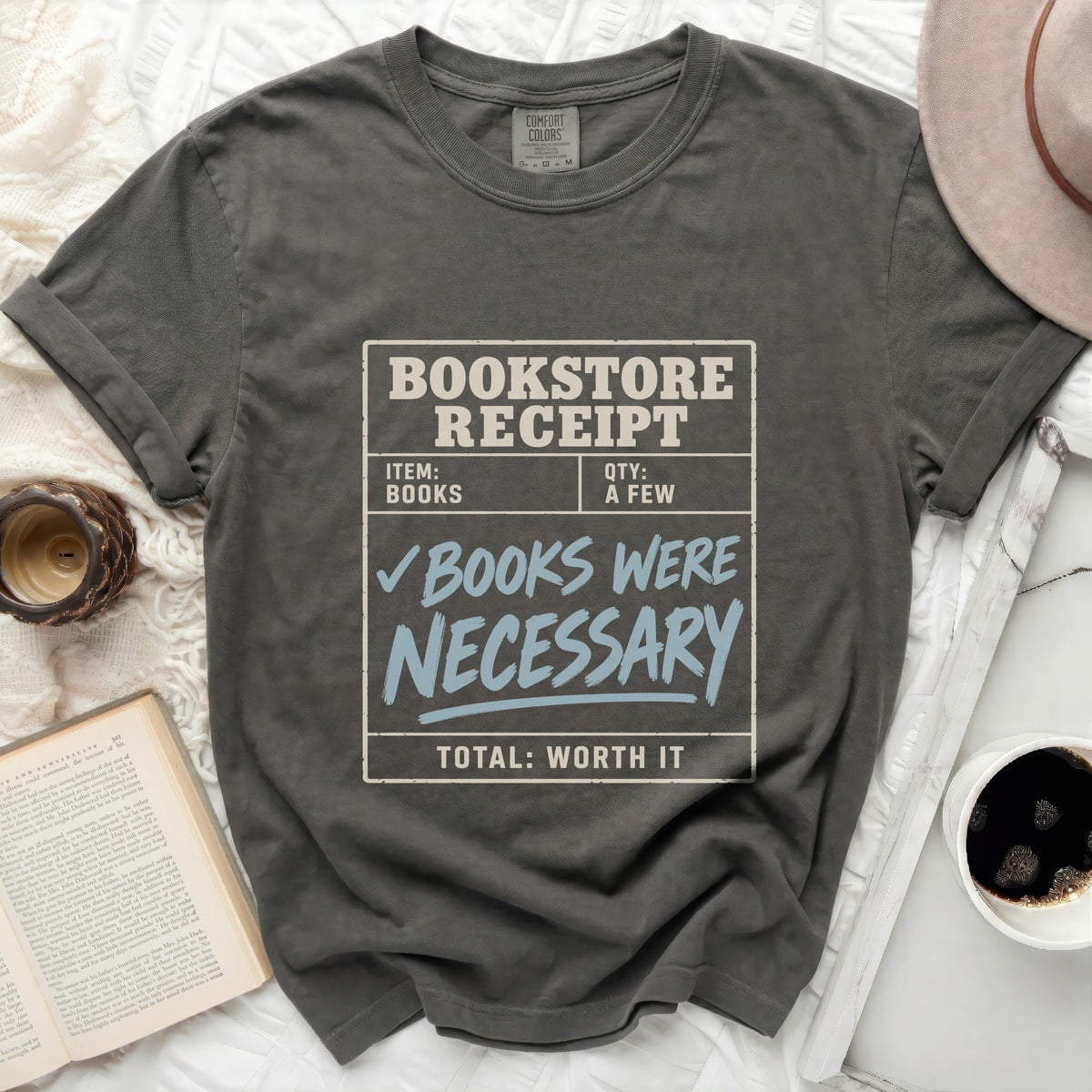 Bookstore receipt graphic on a dark gray t-shirt that says "Books Were Necessary."