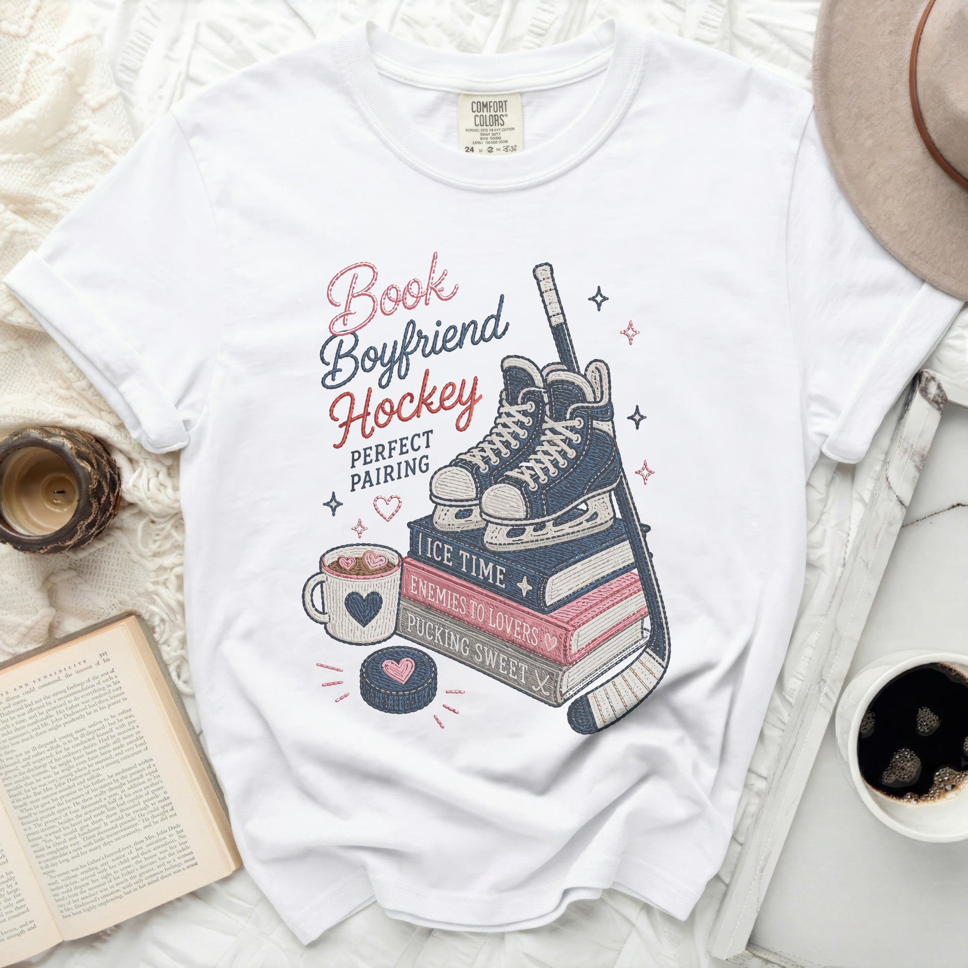 White t-shirt with "Book Boyfriend Hockey" graphic and ice skates.