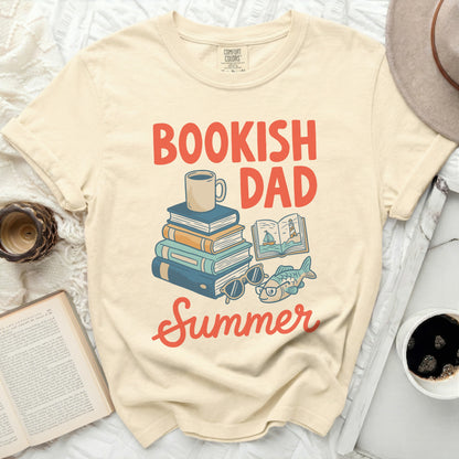 Cream t-shirt with "Bookish Dad Summer" text and stacked books graphic.
