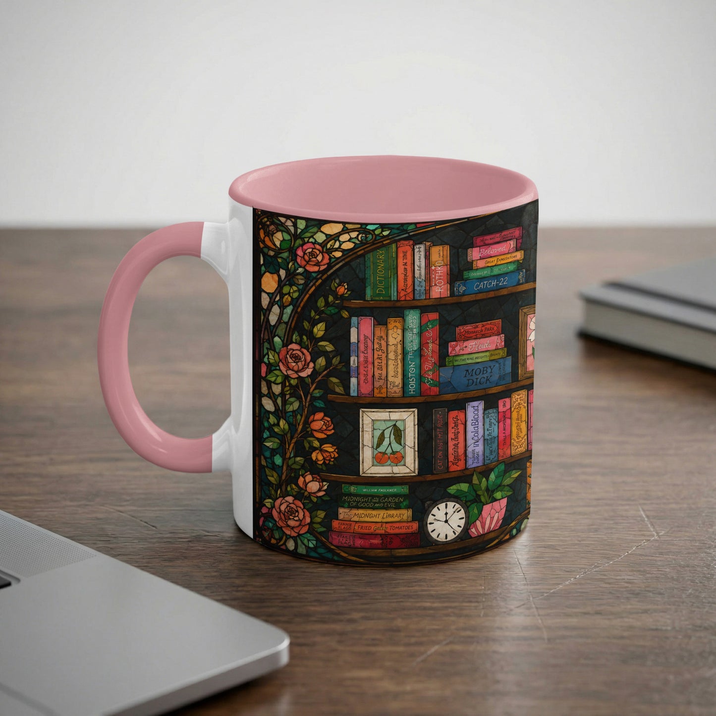 Mug with pink handle, featuring a stained glass bookshelf design with roses.