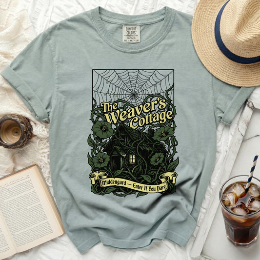 The Weaver's Cottage t-shirt with spooky cottage and spiderweb graphic.