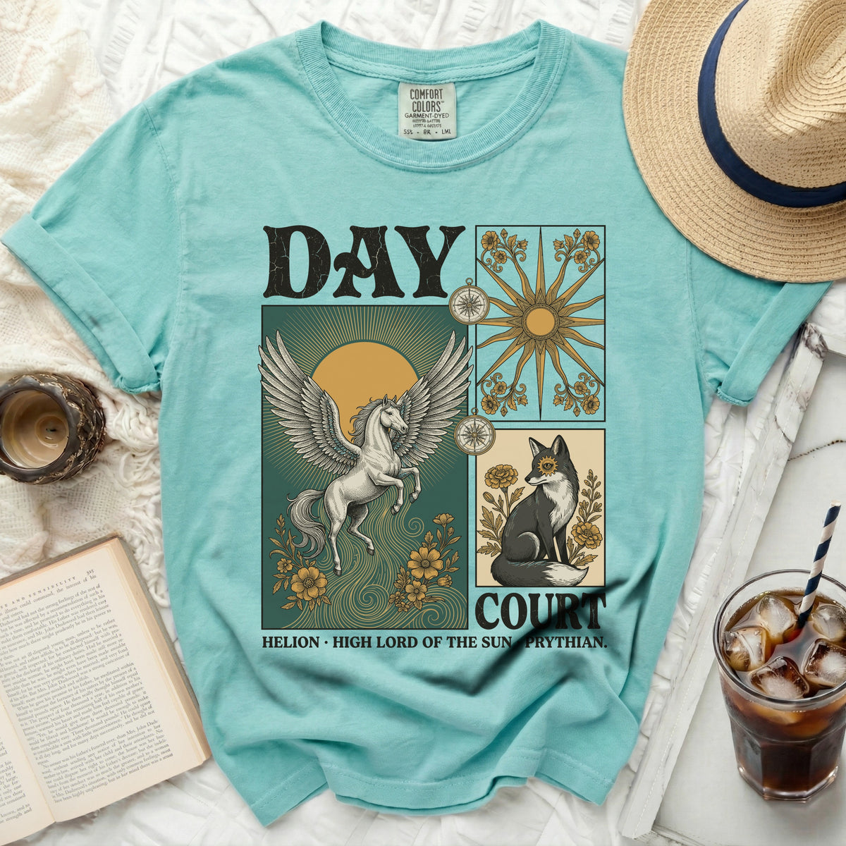 Teal t-shirt with "DAY COURT" and mythological graphics: Pegasus, fox, suns.