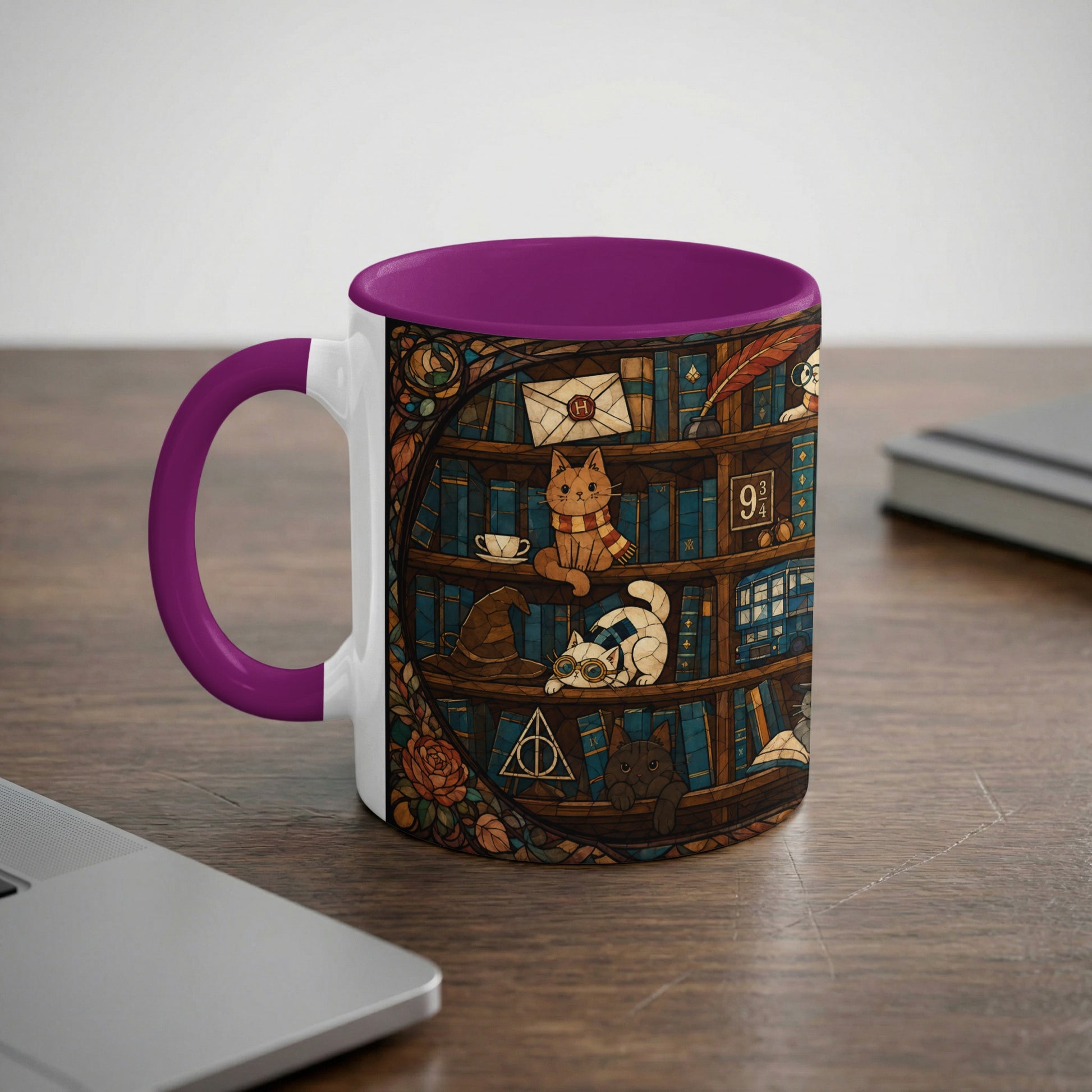 Mug with purple handle, featuring cats among books, a hat, and "9 3/4".