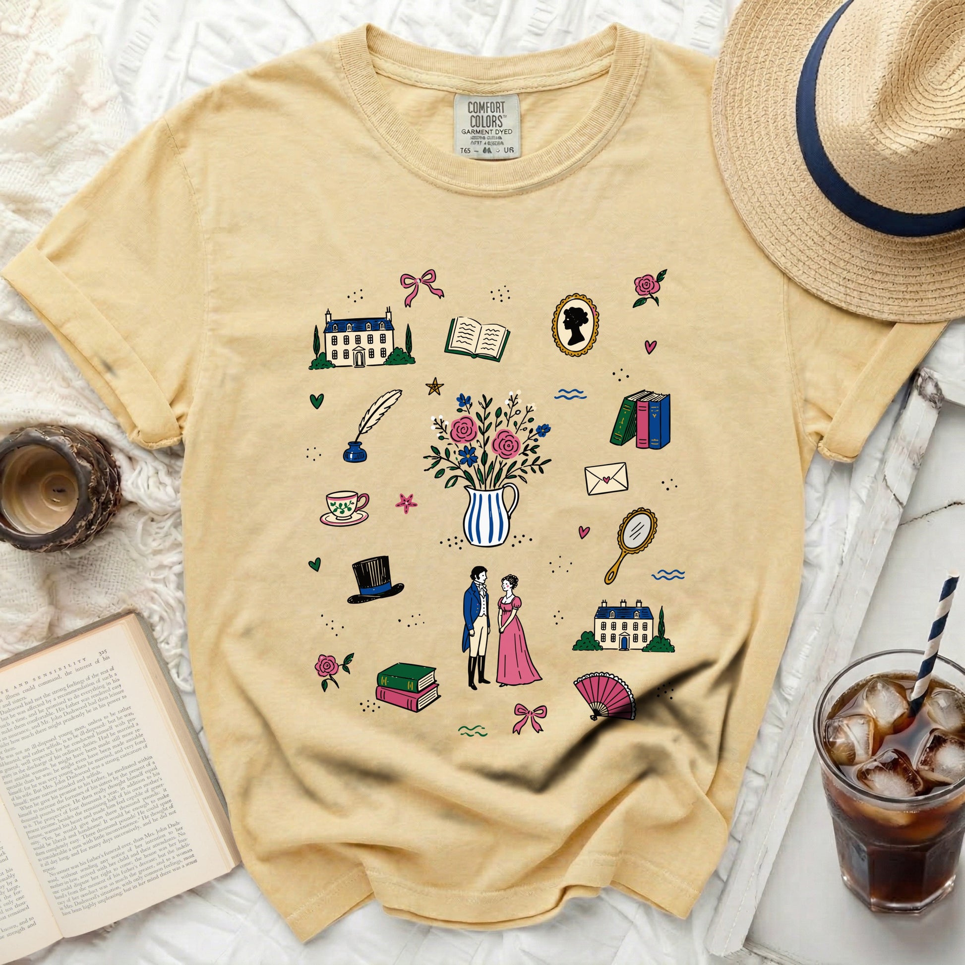 Yellow t-shirt with a graphic print of regency-era illustrations.
