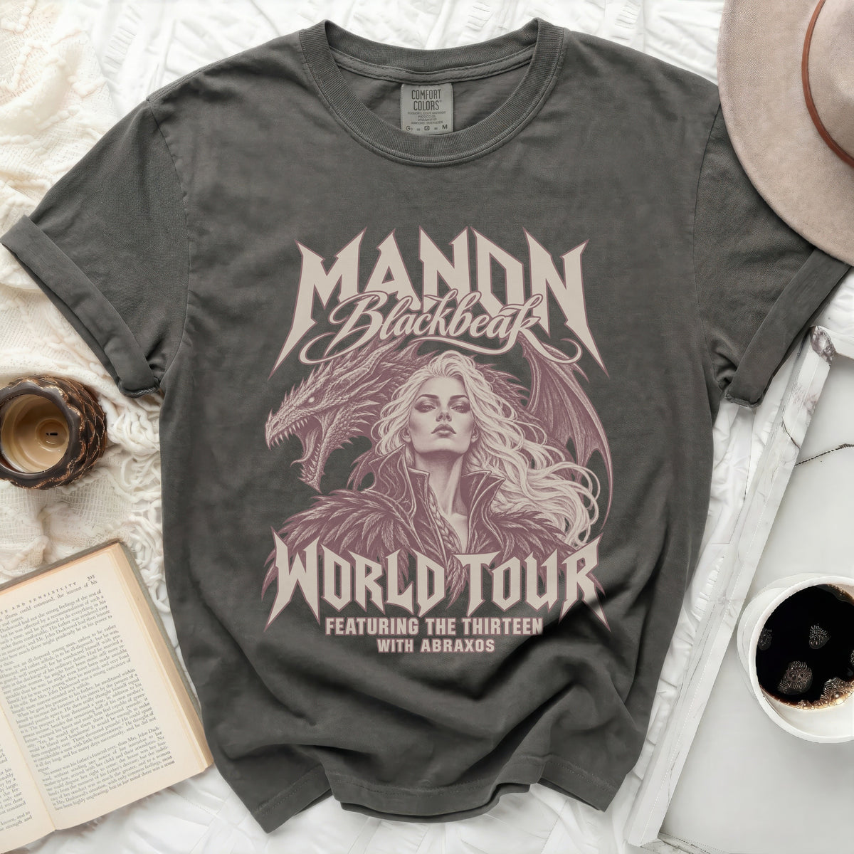 Manon Blackbeak World Tour t-shirt featuring dragon and woman graphic.