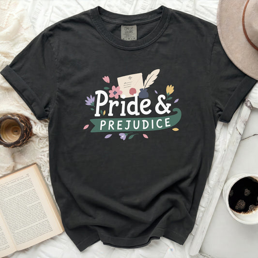 Dark t-shirt with "Pride & Prejudice" text and floral graphic.