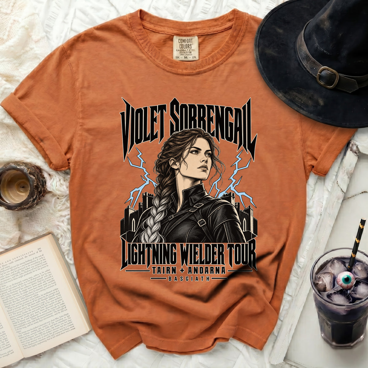 Orange t-shirt with Violet Sorrengail Lightning Wielder Tour graphic.