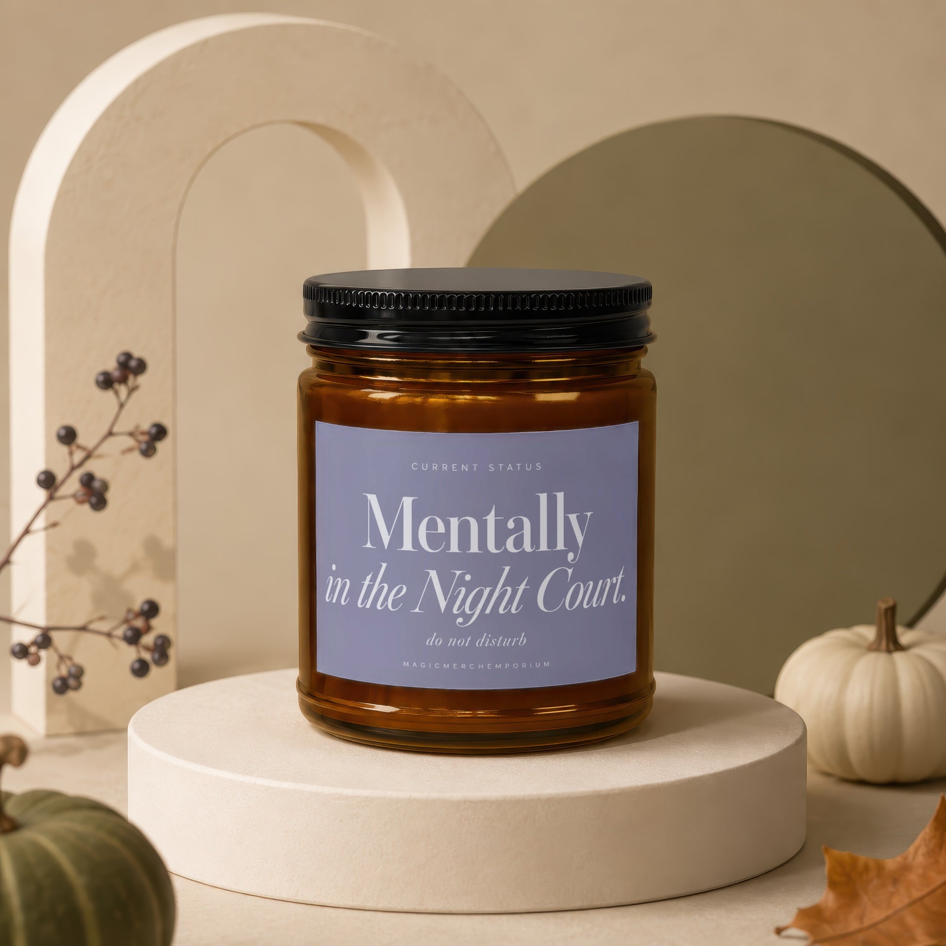 Amber jar candle with "Mentally in the Night Court. do not disturb" text.