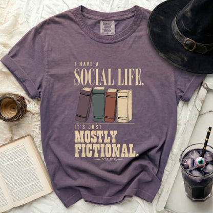 Purple t-shirt with "I Have a Social Life. It's Just Mostly Fictional." text.