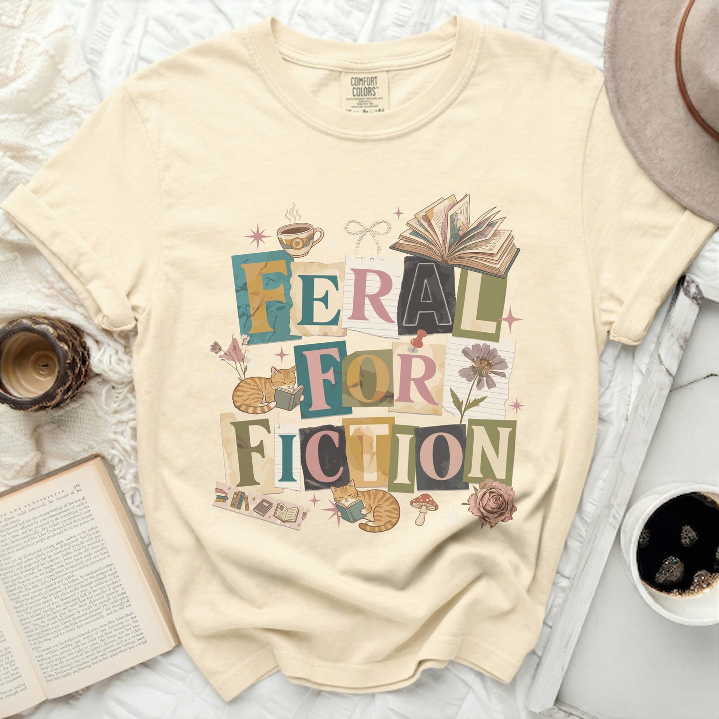 Feral for Fiction text design with cats, books, coffee, and flowers.