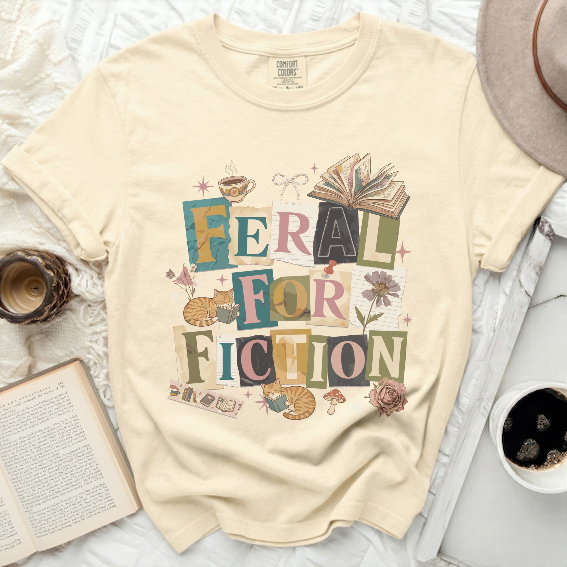 Feral for Fiction text design with cats, books, coffee, and flowers.