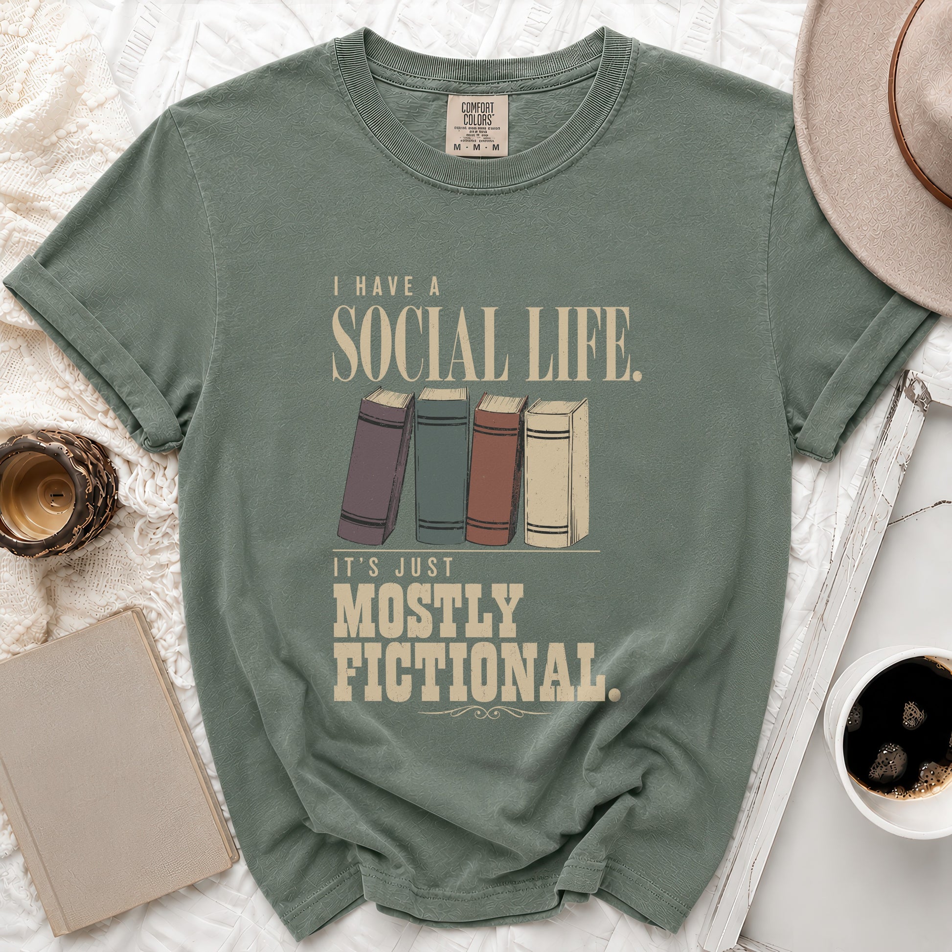 Green t-shirt with "I have a social life. It's just mostly fictional." text.