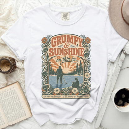 White t-shirt with vintage "Grumpy Sunshine on Thin Ice" graphic and hockey scene.
