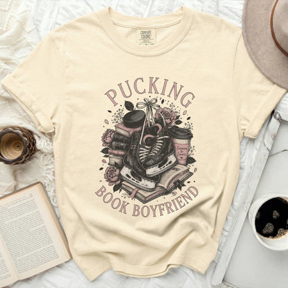 T-shirt with "Pucking Book Boyfriend" text and hockey ice skates.