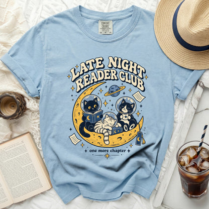 Light blue t-shirt with "Late Night Reader Club" and cats reading on the moon.